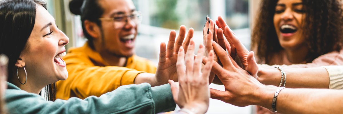 Multiracial happy young people stacking hands-Group of diverse f Multiracial happy young people stacking hands-Group of diverse f