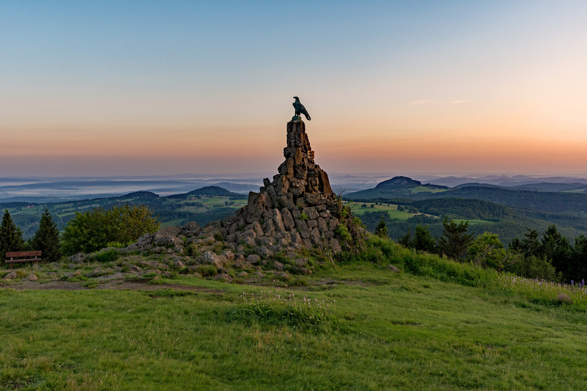 Sunrise at the aviation memorial on the Wasserkuppe in the Rhön in Hesse, Germany Sunrise at the aviation memorial on the Wasserkuppe in the Rhön in Hesse, Germany